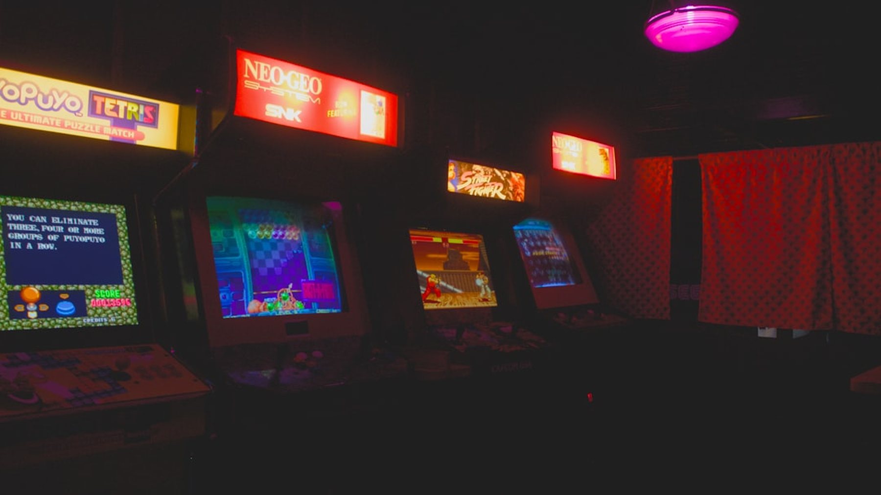 The Signal Room gaming lounge at White Heath, low light over the tables